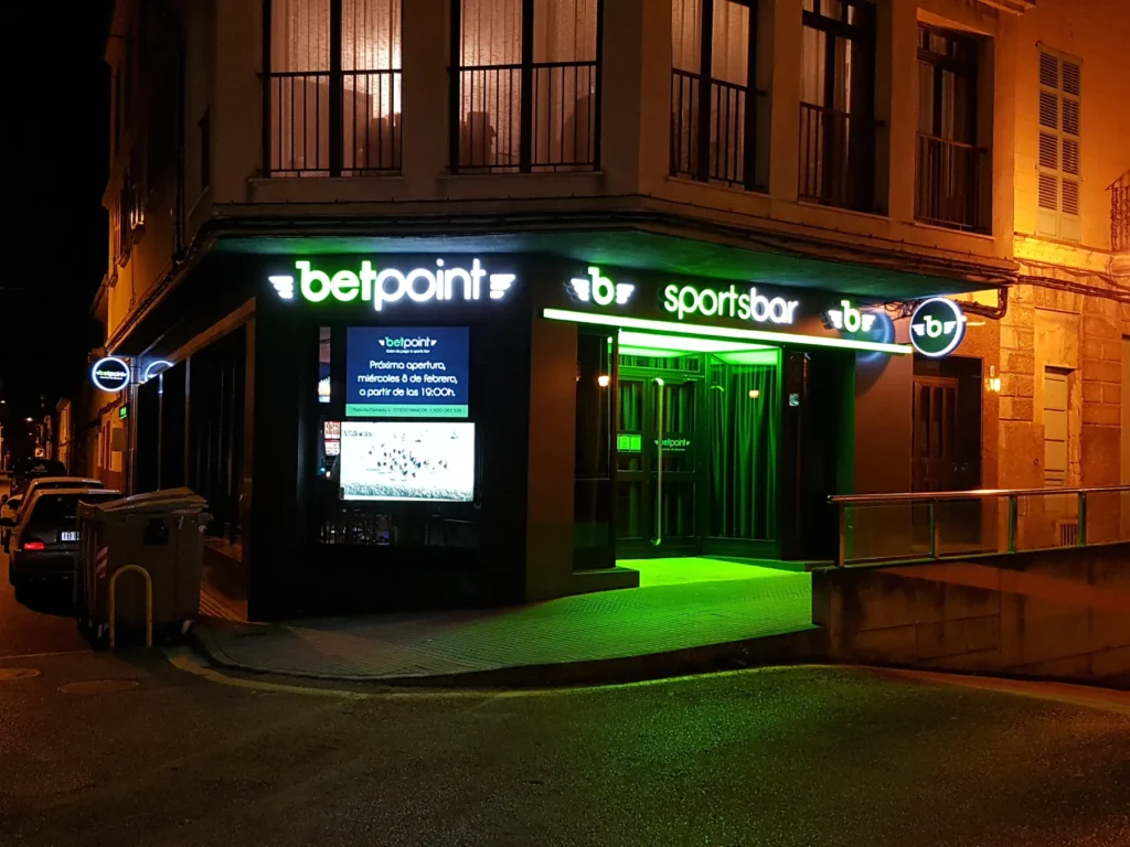 Illuminated facade of the Bet Point casino in Manacor