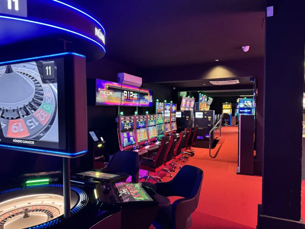 Electronic roulette and a row of slot machines at the Can Picafort Hall